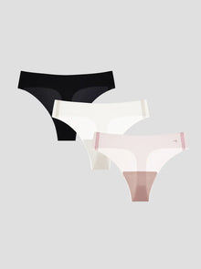 Three pairs of NuCloud Original Thong in black, white, and pink on a light gray background.